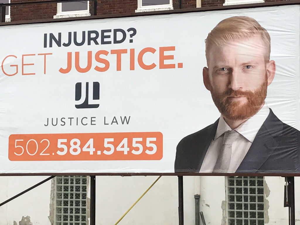 Scott Justice Headshot on a Billboard