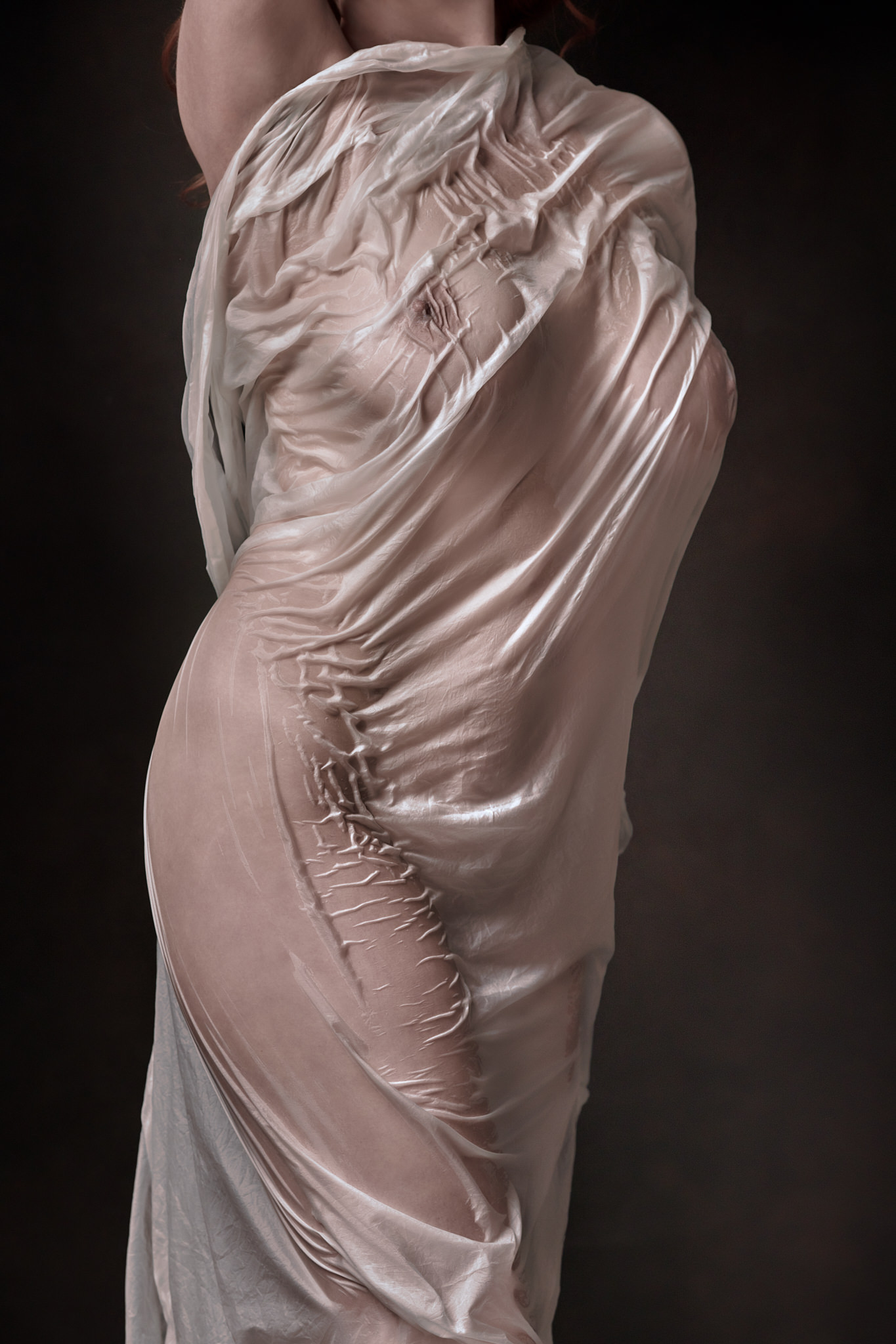 Boudoir portrait styled with wet silk