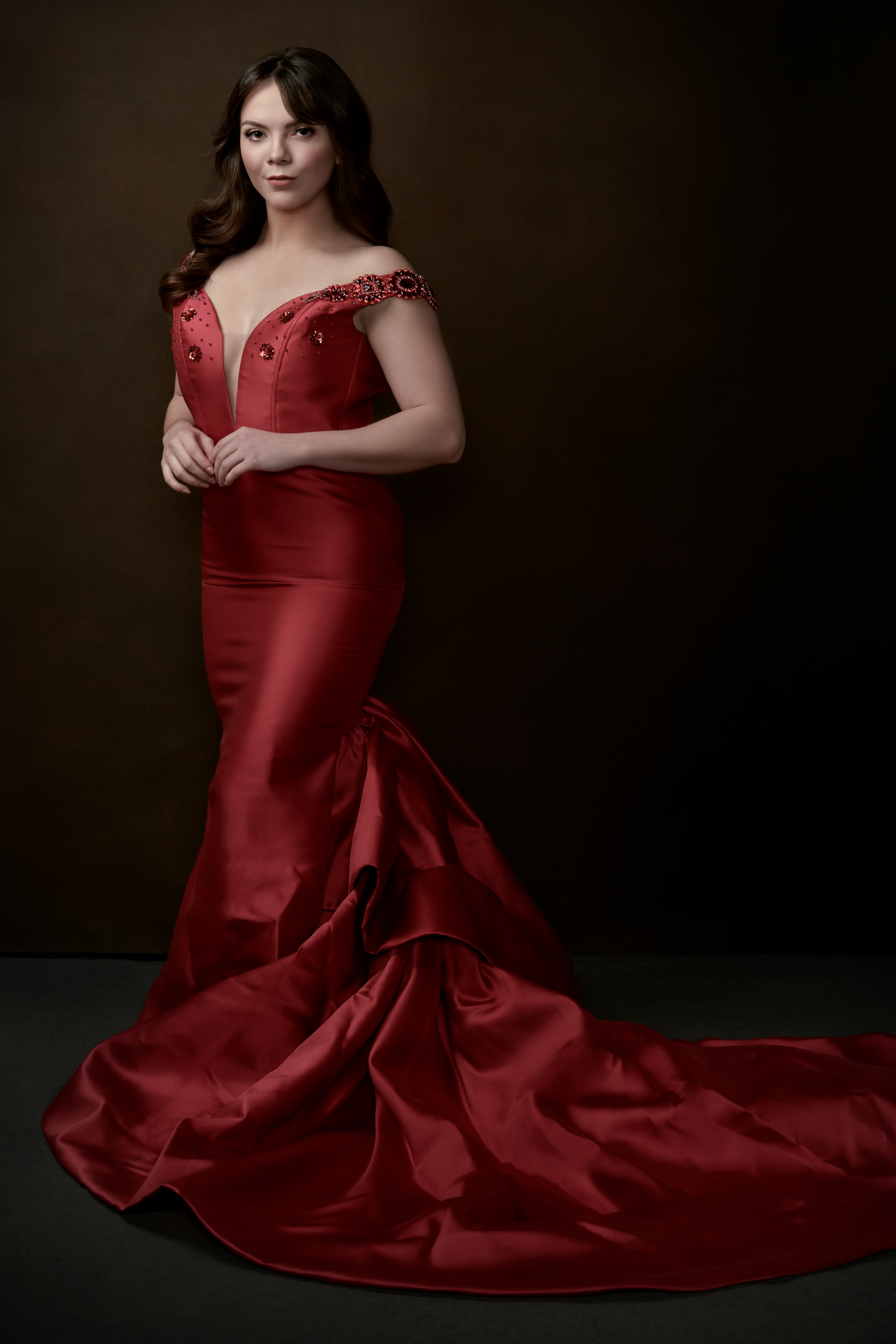 Portrait of a woman in a formal red dress